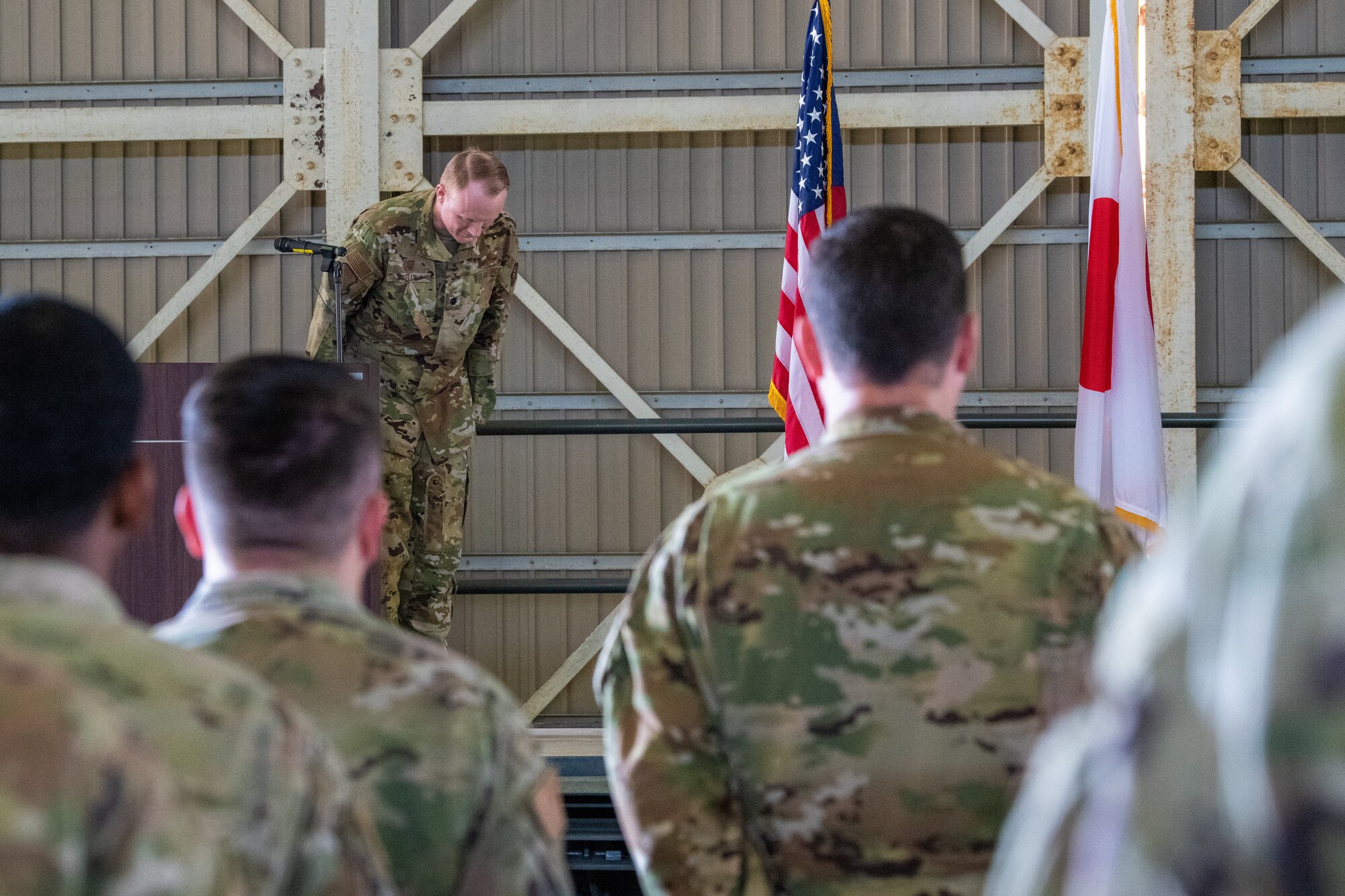 Commander bows to audience