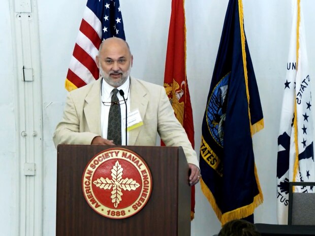 David Fayocavitz of Naval Surface Warfare Center, Philadelphia Division, received the 2022 Hilleman Award during MegaRust 2022, the American Society of Naval Engineers’ annual corrosion conference, in San Diego, Calif., on June 3, 2022. (U.S. Navy Photo / Screenshot by Gary Ell, Released)