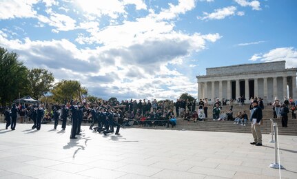 The United States Air Force Honor Guard Drill Team performs their routine during the Joint Services Drill Exhibition Oct. 19, 2022, at the Lincoln Memorial Plaza, Washington, D.C. The Honor Guard Drill Team’s mission is to promote the Air Force mission by showcasing drill performances at public and military venues to recruit, retain and inspire Airmen. (U.S. Air Force photo by Jason Treffry)