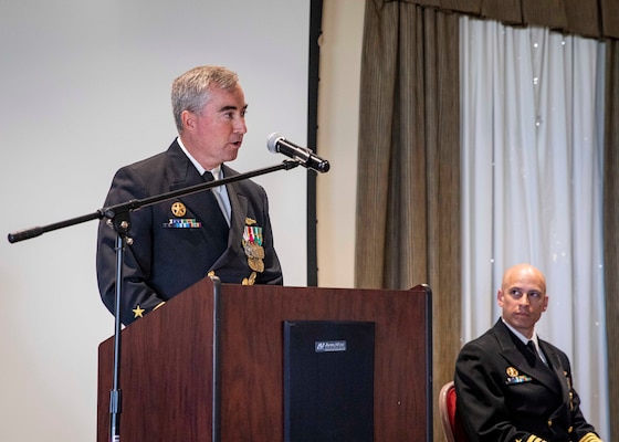 Capt. Brian Hogan, commodore, Submarine Squadron Eight, delivers remarks during a change of command ceremony for the Los Angeles-class attack submarine USS Boise (SSN 764) onboard Naval Station Norfolk, Oct. 21, 2022.