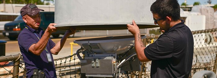 Ku Band satellite communications system installation aboard USS Fitzgerald (DDG 62) in Joint Base Pearl Harbor-Hickham, Hawaii, June 27, 2022.