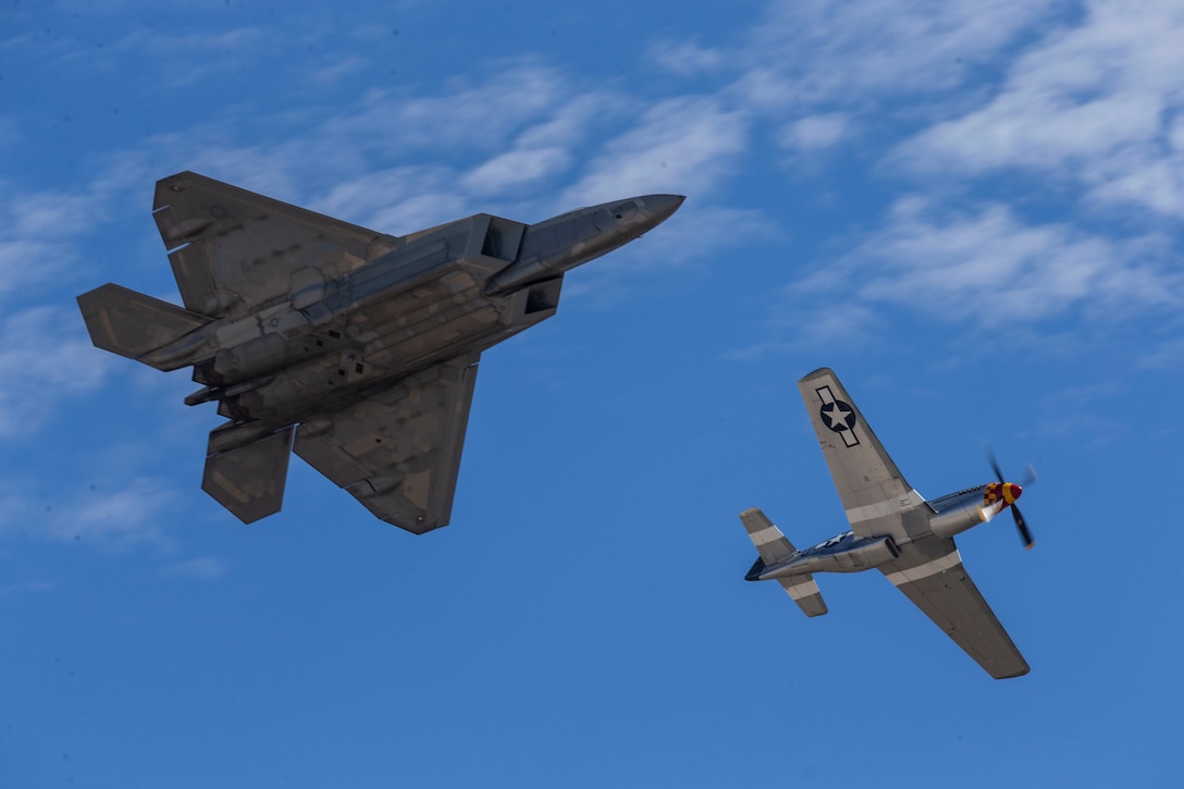 A U.S. Air Force F-22 Raptor and a P-51D Mustang conduct a heritage flight during the 2022

Marine Corps Air Station Miramar Air Show at MCAS Miramar, San Diego, California, Sept. 24,

2022. The F-22 Raptor is the Air Force's fifth-generation fighter aircraft. Its combination of

stealth, supercruise, maneuverability, and integrated avionics, coupled with improved

supportability, represents an exponential leap in warfighting capabilities. The theme for the

2022 MCAS Miramar Air Show, “Marines Fight, Evolve and Win,” reflects the Marine Corps’

ongoing modernization efforts to prepare for future conflicts. (U.S. Marine Corps photo by Cpl. Andrew Cortez)