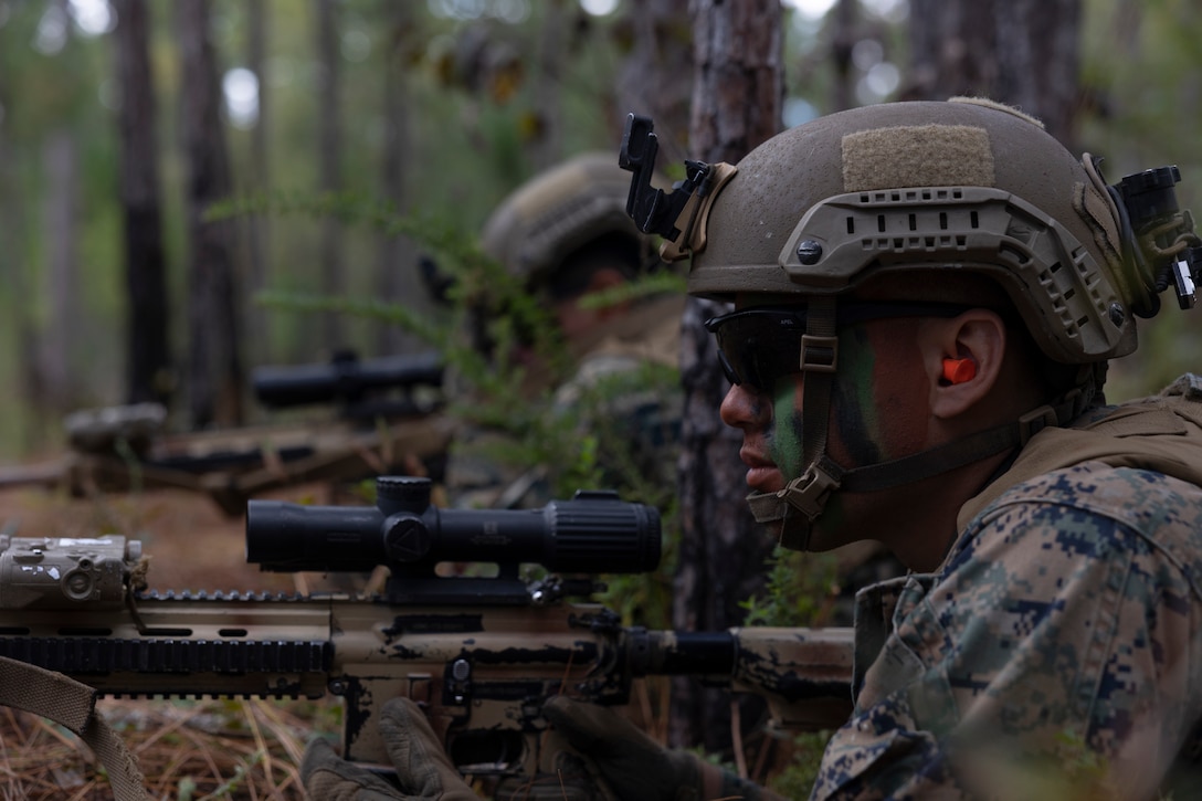 A U.S. Marine with 1st Battalion, 6th Marine Regiment, 2nd Marine Division, posts security during a Marine Corps Combat Readiness Evaluation on Camp Lejeune, North Carolina, Oct. 4, 2022. The purpose of a MCCRE is to formally evaluate the unit’s combat readiness in preparation for deployment.
