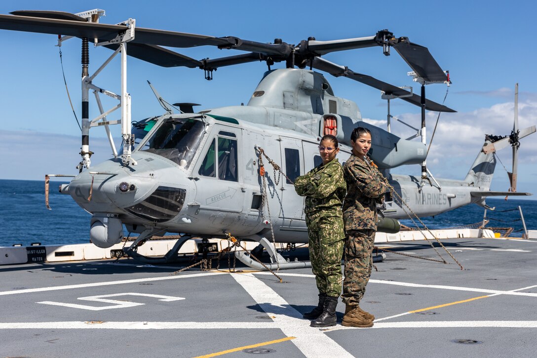 U.S. Marine Corps Lance Cpl. Charisse Briguera, right, a rifle Marine with Delta Company, 4th Light Armored Reconnaissance Battalion, 4th Marine Division, in support of Special Purpose Marine Air-Ground Task Force UNITAS LXIII poses for a photo with Marina Milagros Correa (Private Uruguayan Marine Corps) during exercise UNITAS LXIII aboard the USS Mesa Verde (LPD 19), Sept. 18, 2022. UNITAS is the world’s longest-running annual multinational maritime exercise that focuses on enhancing interoperability among multiple nations and joint forces during littoral and amphibious operations in order to build on existing regional partnerships and create new enduring relationships that promote peace, stability, and prosperity in the U.S. Southern Command’s area of responsibility. (U.S. Marine Corps photo by Lance Cpl. David Intriago)