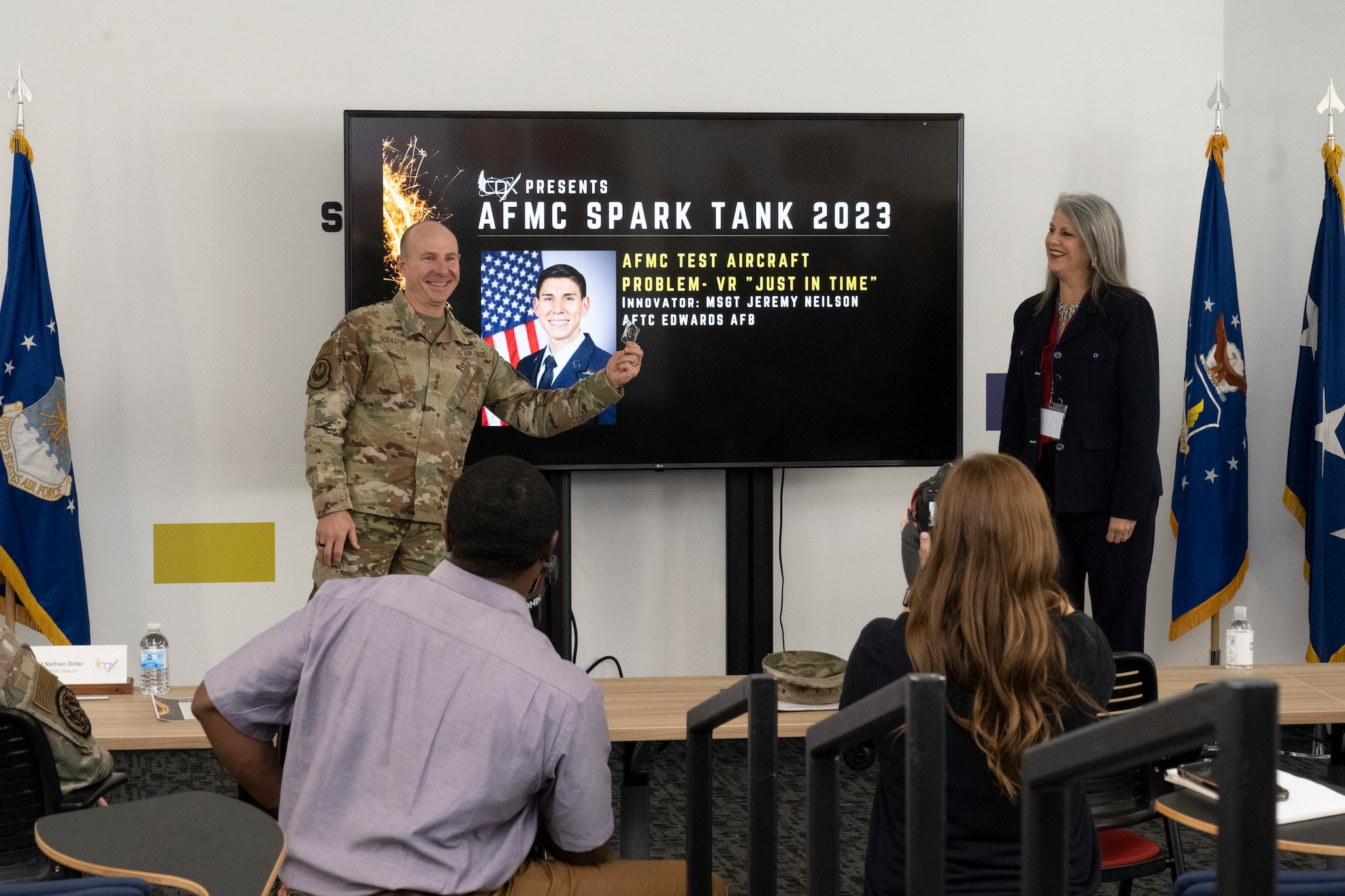 Lt. Gen. Schaefer recognizes a SparkTank finalist