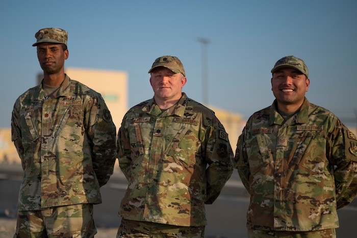 From left, Maj. Brian Wright, Lt. Col. Joshua Elwell and Tech. Sgt. Joseph Martínez are the first appointed members of the 386 Air Expeditionary Wing’s Task Force 99.M--the very first satellite innovation cell under U.S. Air Forces Central Command’s Task Force 99. TF 99.M is located at Ali Al Salem Air Base, Kuwait and stood up Oct. 26, 2022. TF 99.M, which pays tribute to the 386 AEW’s mascot, the Marauder, while maintaining the lineage of AFCENT’s TF 99, brings the wing’s innovation efforts under one office. (U.S. Air Force photo by Staff Sgt. Dalton Williams)