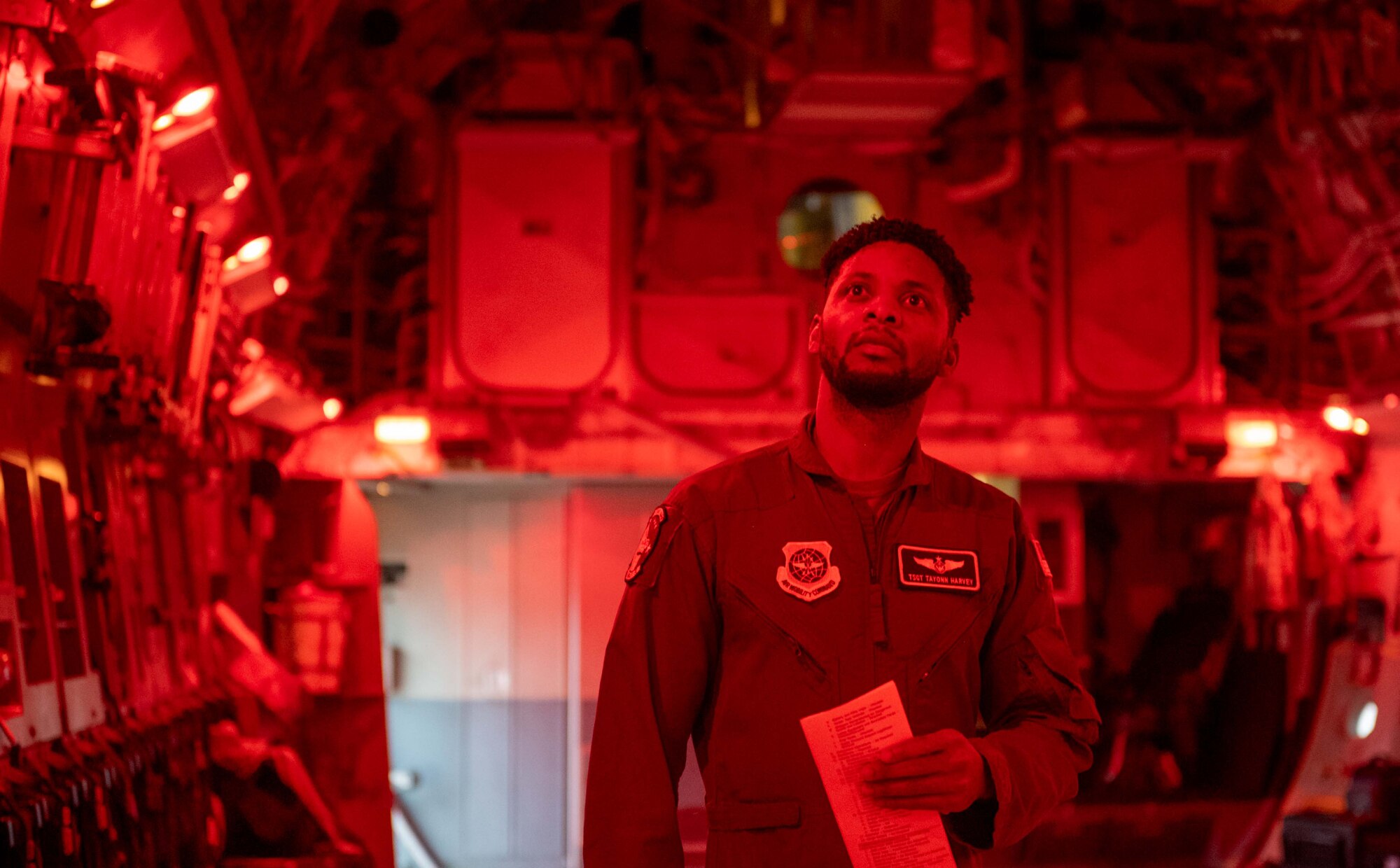 Tech. Sgt. Tayonn Harvey, 3rd Airlift Squadron loadmaster, performs preflight checks on a C-17 Globemaster III during a local training flight at Dover Air Force Base, Delaware, Oct. 24, 2022. The 3rd AS operates Dover AFB’s C-17s to fulfill worldwide air mobility requirements. (U.S. Air Force photo by Senior Airman Faith Barron)