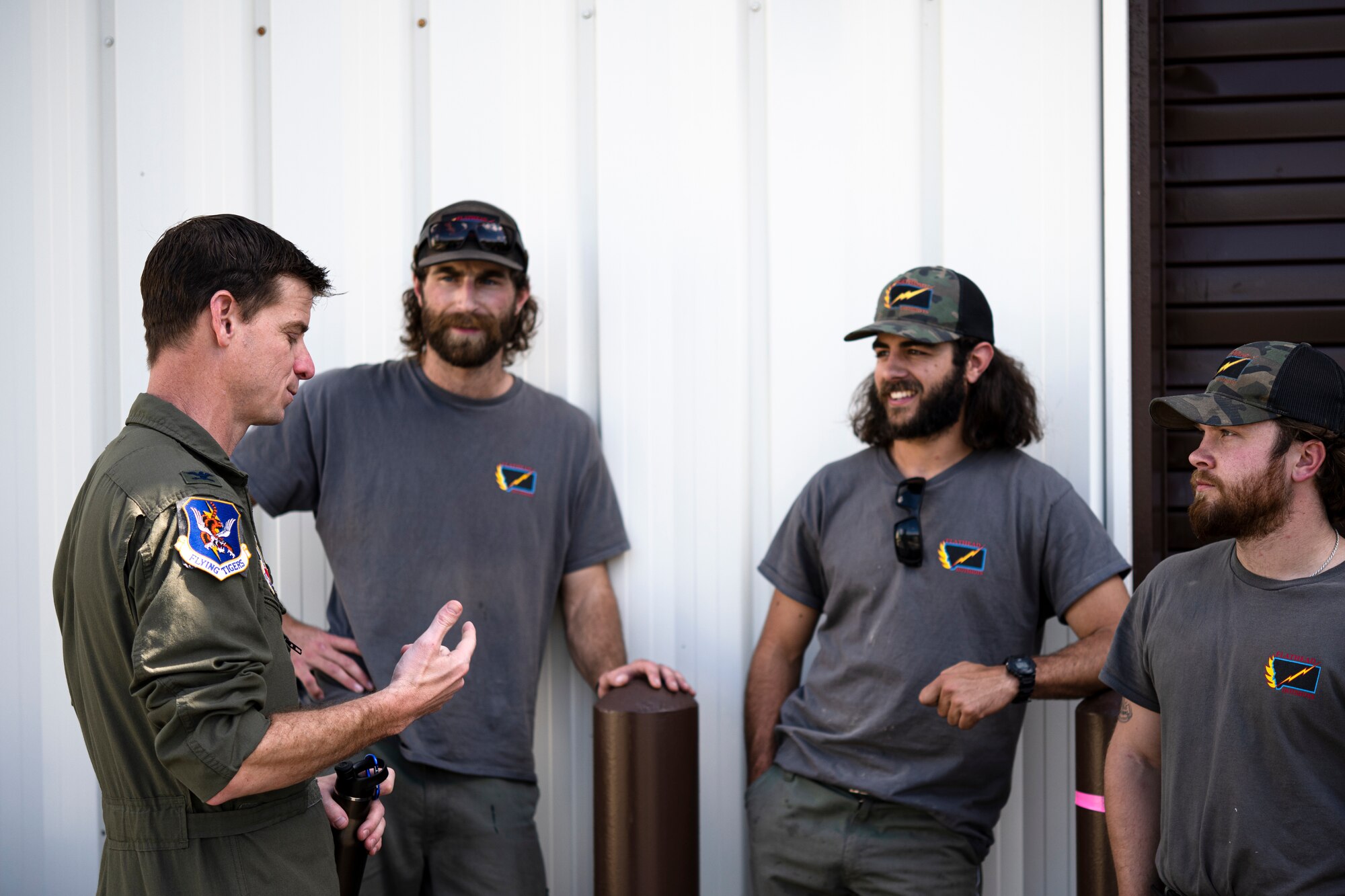 Photo of people conversing