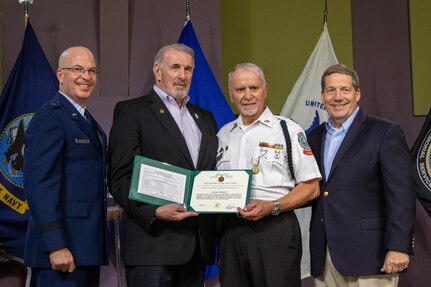 Awardee receives award.