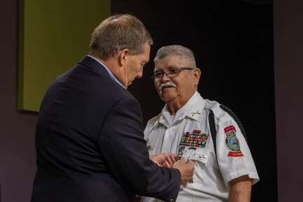 Awardees receive award.