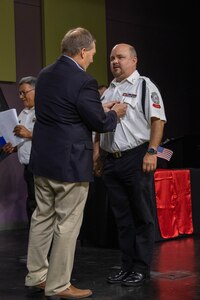Awardee receives award