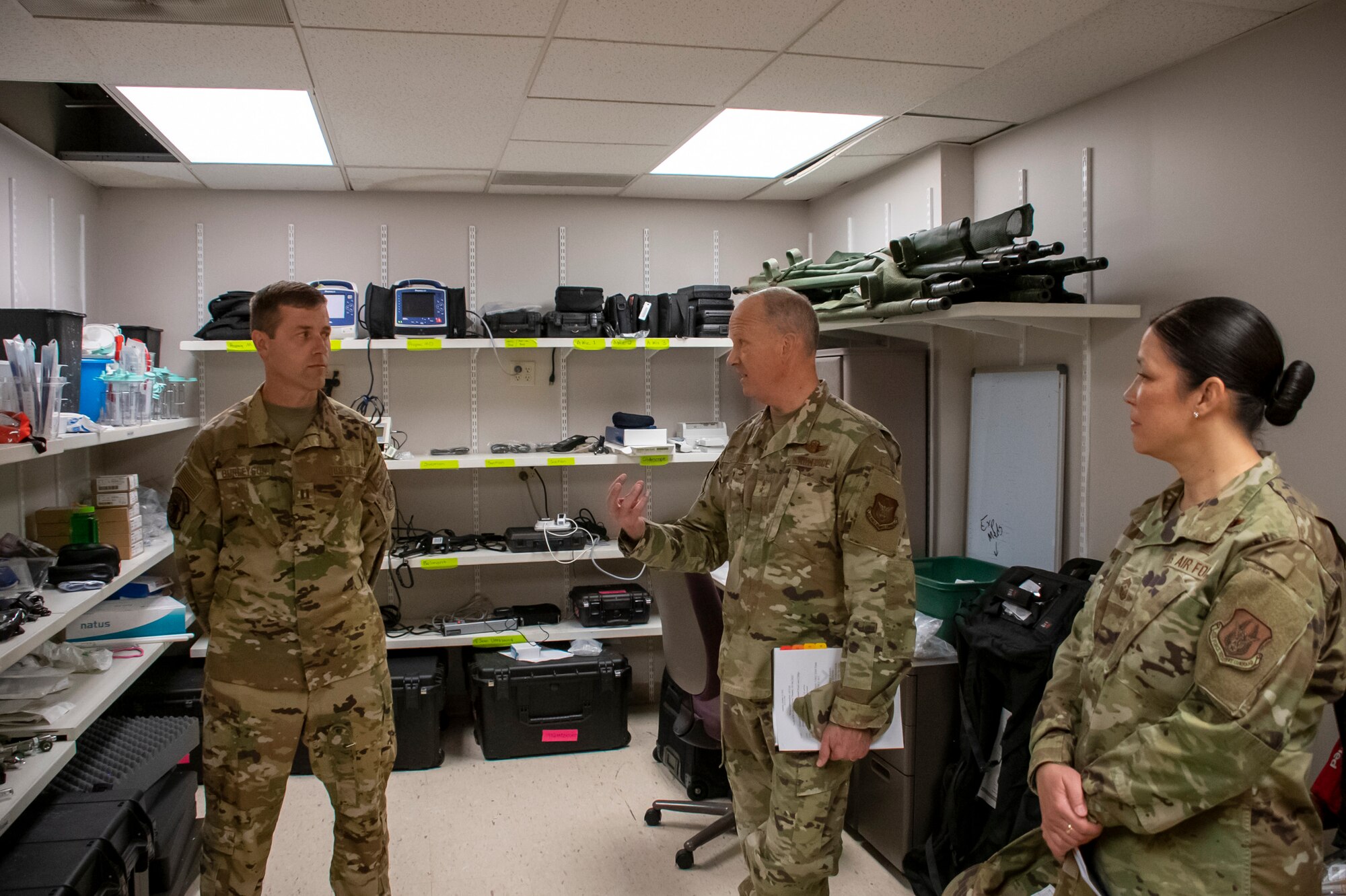 Maj. Gen. Bret Larson, 22nd Air Force commander and Chief Master Sgt. Chin Cox, 22nd Air Force command chief, talks with Capt. Travis Burleyson, 932nd Medical Squadron nurse anesthetist, during a tour at the 932nd Airlift Wing, Oct. 16, 2022, at Scott Air Force Base, Illinois. While at the 932nd, Larson and Cox met with Citizen Airmen around the wing to discuss how the higher command could best serve them and the importance of bridging the gap between the decision-makers and the Airmen they affect. (U.S. Air Force photo/Senior Airman Jonathan Stefanko)