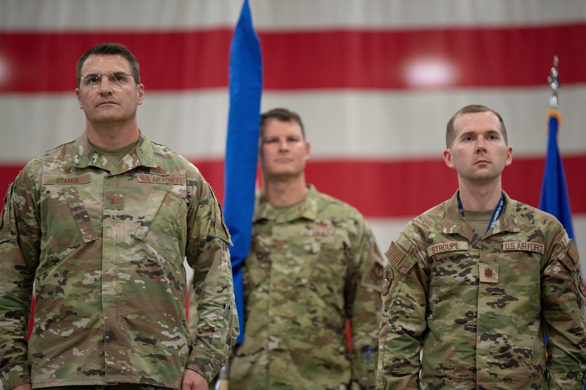 U.S. Air Force Col. Joseph Stangl and Maj. Nathan Stroupe stand at the position of attention.
