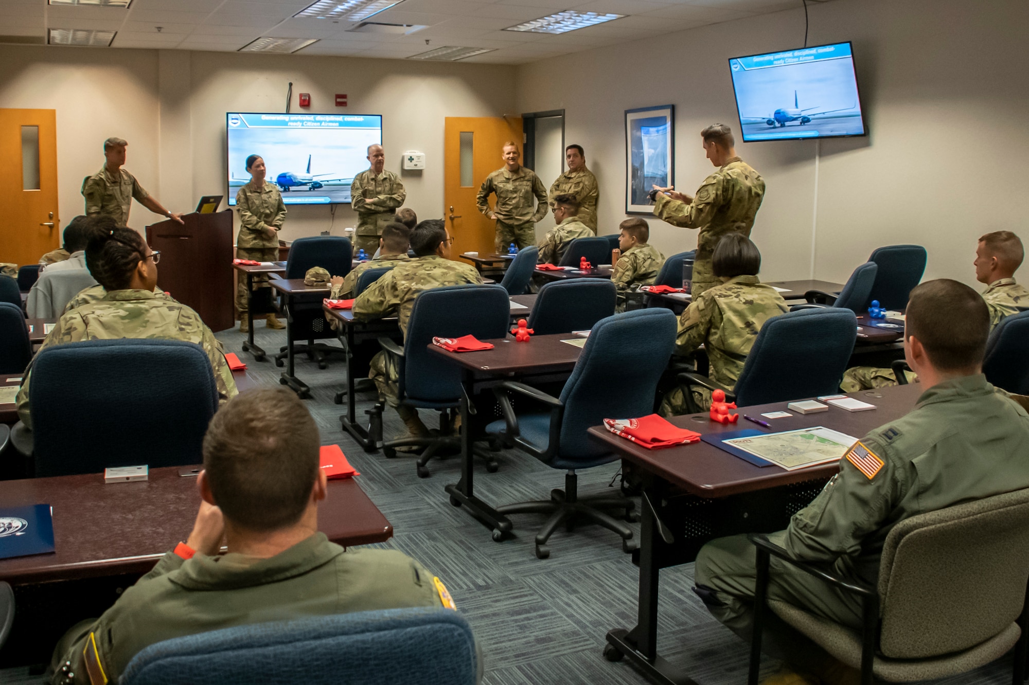 Maj. Gen. Bret Larson, 22nd Air Force commander and Chief Master Sgt. Chin Cox, 22nd Air Force command chief, speak with 932nd Airlift Wing newcomers, Oct. 16, 2022, at Scott Air Force Base, Illinois. While at the 932nd, Larson and Cox met with Citizen Airmen around the wing to discuss how the higher command could best serve them and the importance of bridging the gap between the decision-makers and the Airmen they affect. (U.S. Air Force photo/Senior Airman Jonathan Stefanko)