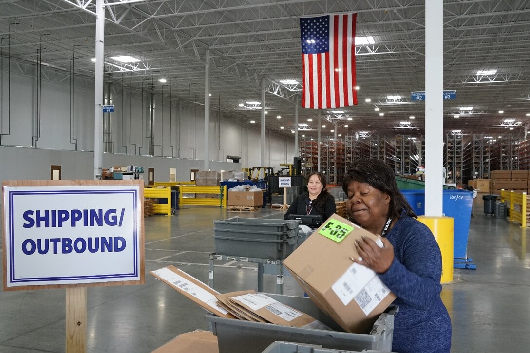 DDJC employees Charrisse Johnson and Margarita Pelayo process F-35 material.