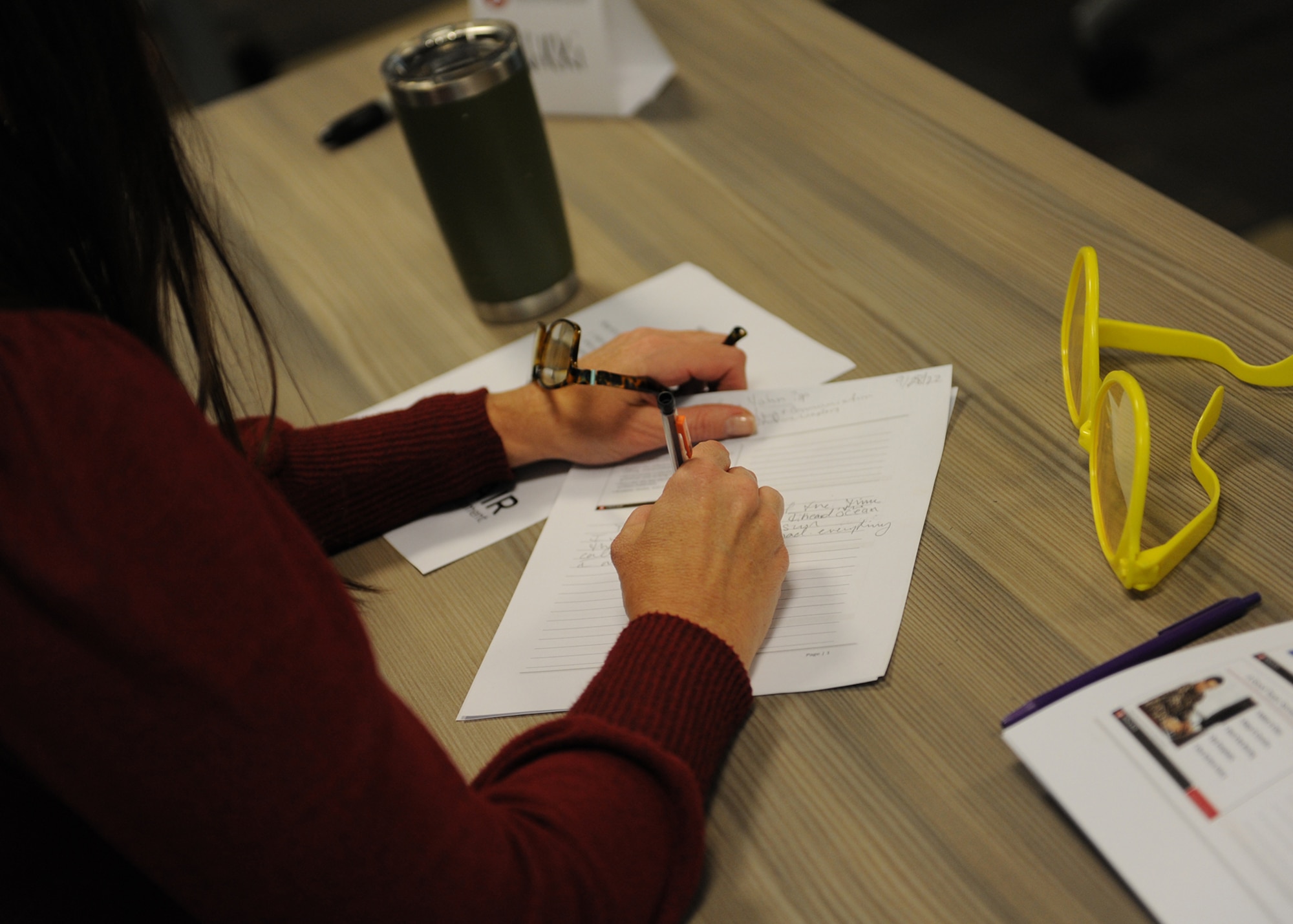 A class participant takes notes during a Sept. 27 course on Objective Self-Editing at the National Air and Space Intelligence Center at Wright-Patterson Air Force Base Ohio. The course was part of NASIC’s UpSkill Intensives – a week-long, no-cost professional development event that ran from Sept. 26 through Sept. 30, 2022. During the week-long program, nearly 550 NASIC military and civilian members participated in one or more of 33 course offerings.  (U.S. Air Force photo by Senior Airman Kristof J. Rixmann)