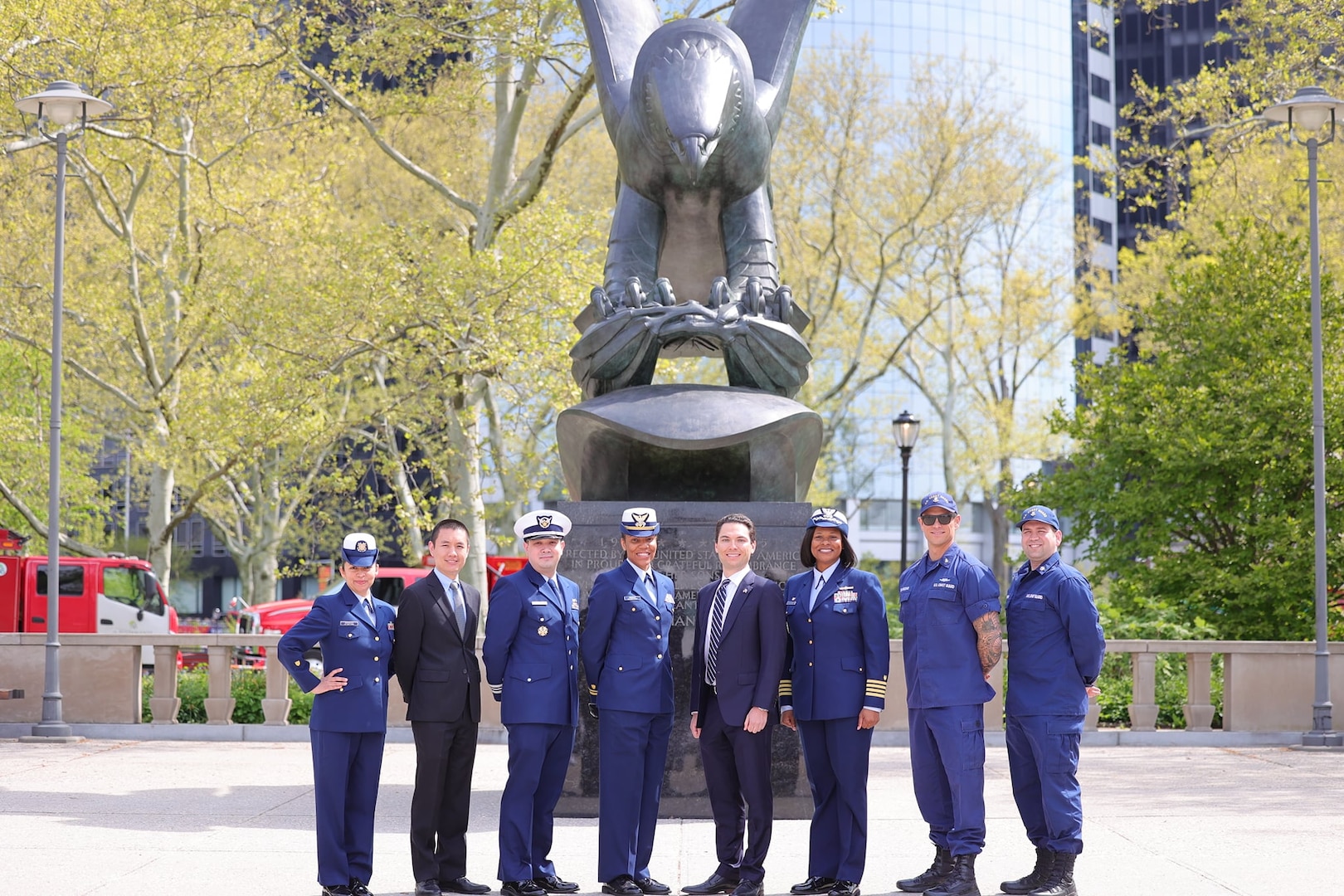 Ensign Michael Barth takes his oath of office as he is joined by friends and active duty and Auxiliary members of Sector New York and the New York Recruiting Office. (Coast Guard Photo by Daniel Henry, US Coast Guard Public Affairs)