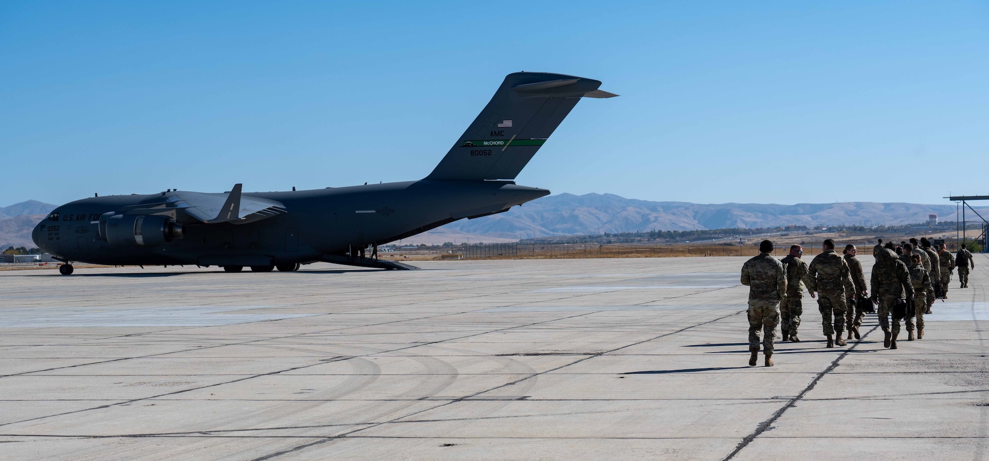 Photo of Airmen walking to aircraft