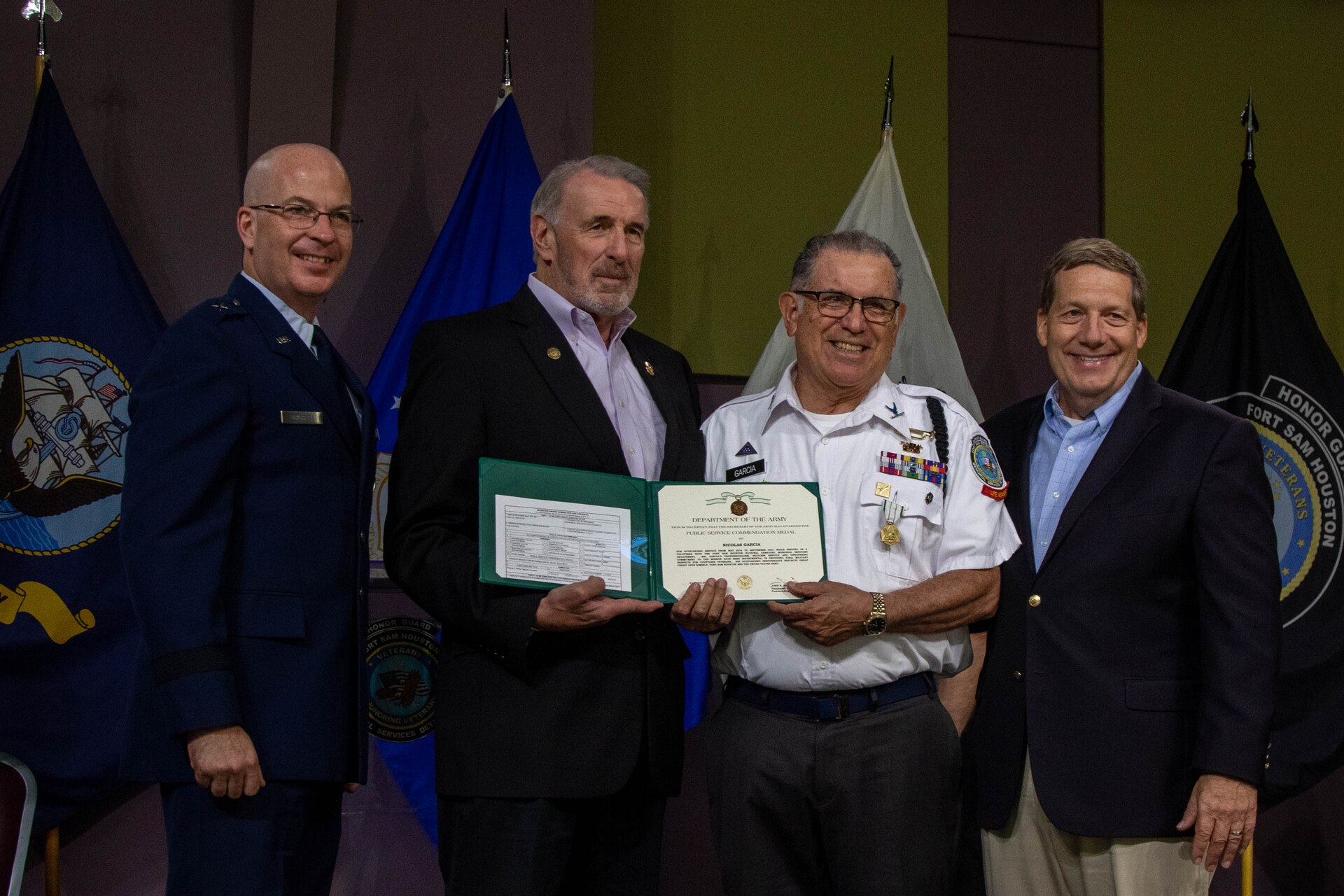 Awardee receives award.