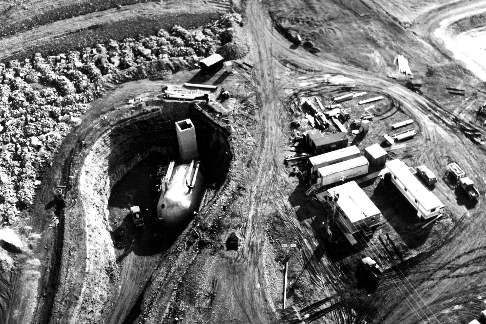A Launch Control Facility under construction near Malmstrom AFB, Wyo. Cold War requirements to build up U.S. nuclear defenses speeded up Minuteman site construction. Builders often labored year-round in three shifts, seven days a week. The Army Corps of Engineers Ballistic Missile Construction Office and its contractors built 1,000 silos between 1961 and 1966. (U.S. Air Force photo)