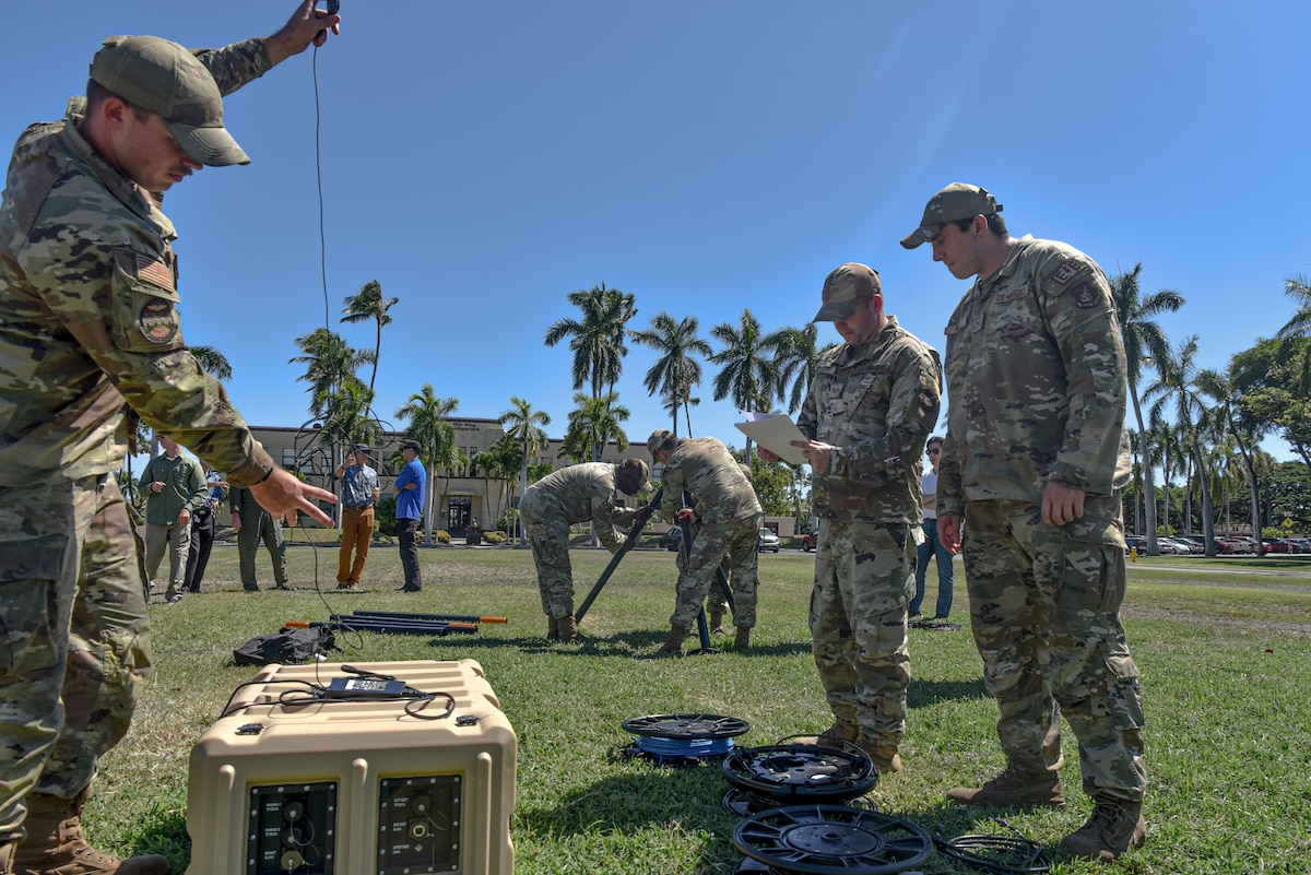 U.S. Air Force Airmen assigned to the 15th Aircraft Maintenance Squadron conduct training on a portable operations network integrator during an innovation demonstration at Joint Base Pearl Harbor-Hickam, Hawaii, Oct. 18, 2022. These Airmen are expanding their knowledge, skills and abilities to better engage in the agile combat employment framework required for multi-capable Airmen and foster ready forces to combatant commanders. (U.S. Air Force photo by Tech. Sgt. Anthony Nelson Jr.)