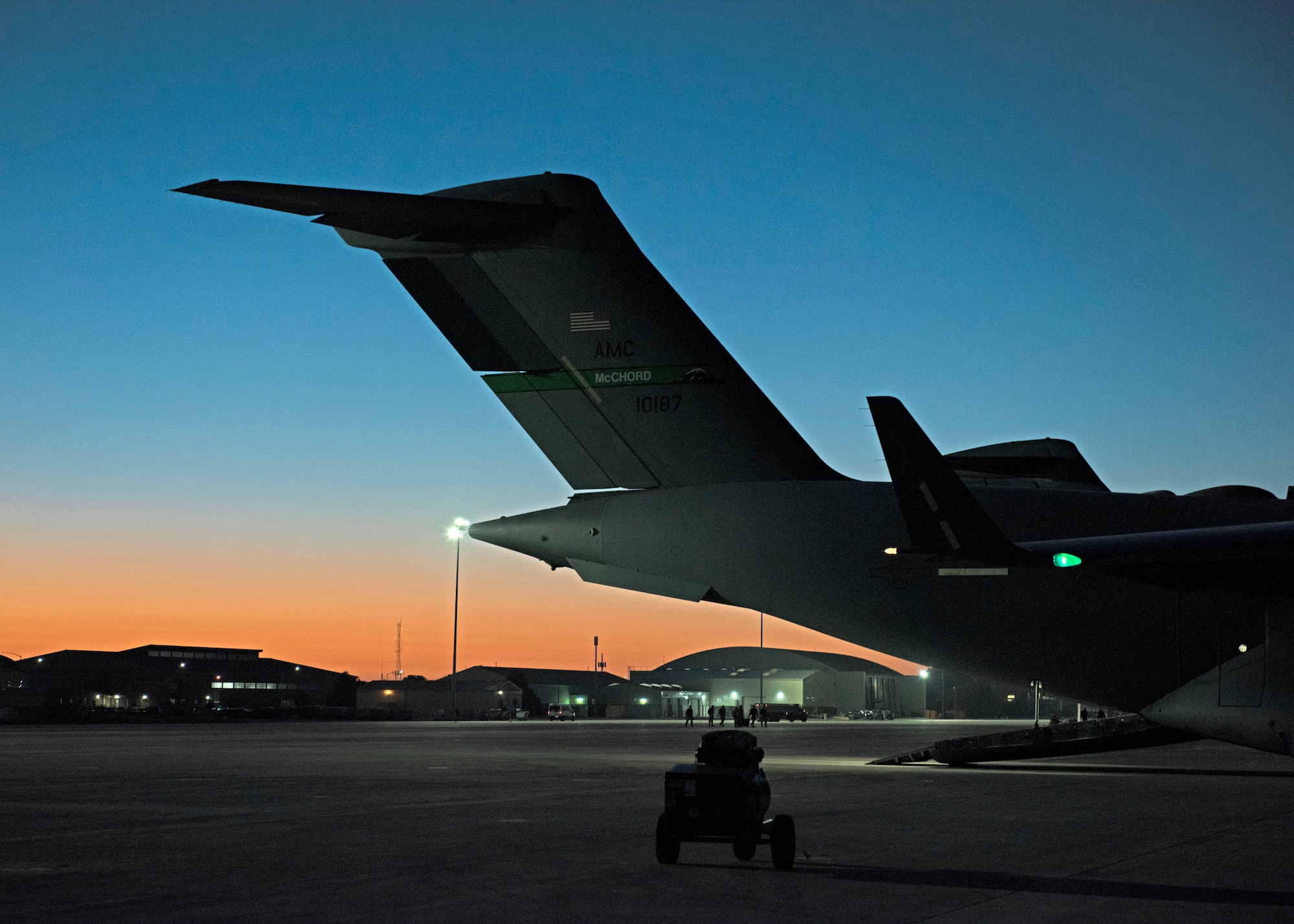 Aircrew with the 62d Airlift Wing prepare to board a C-17 Globemaster III aircraft during Exercise Rainier War 22B at Mountain Home Air Force Base, Idaho, Oct. 18, 2022. Rainier War is used to evaluate and exercise Team McChord’s ability to generate, employ and sustain Rapid Global Mobility into and in support of U.S. Indo-Pacific areas of responsibility. (U.S. Air Force photo by Staff Sgt. Zoe Thacker)
