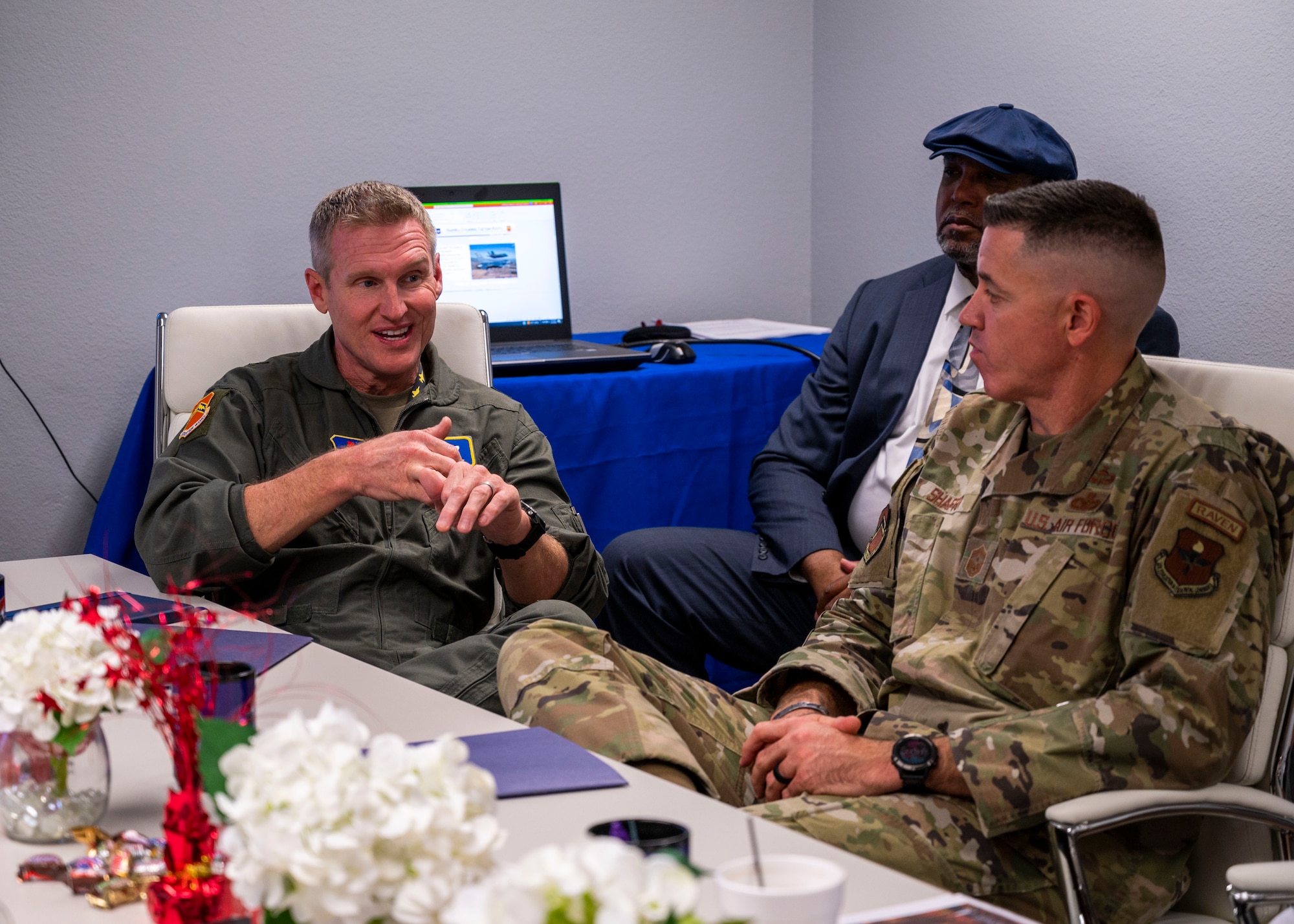 U.S. Air Force Brig. Gen. Jason Rueschhoff, 56th Fighter Wing commander, and Chief Master Sgt. Jason Shaffer, 56th FW command chief, speak to the military wives at the Heart Link Spouse Orientation Oct. 19, 2022, at Luke Air Force Base, Arizona.