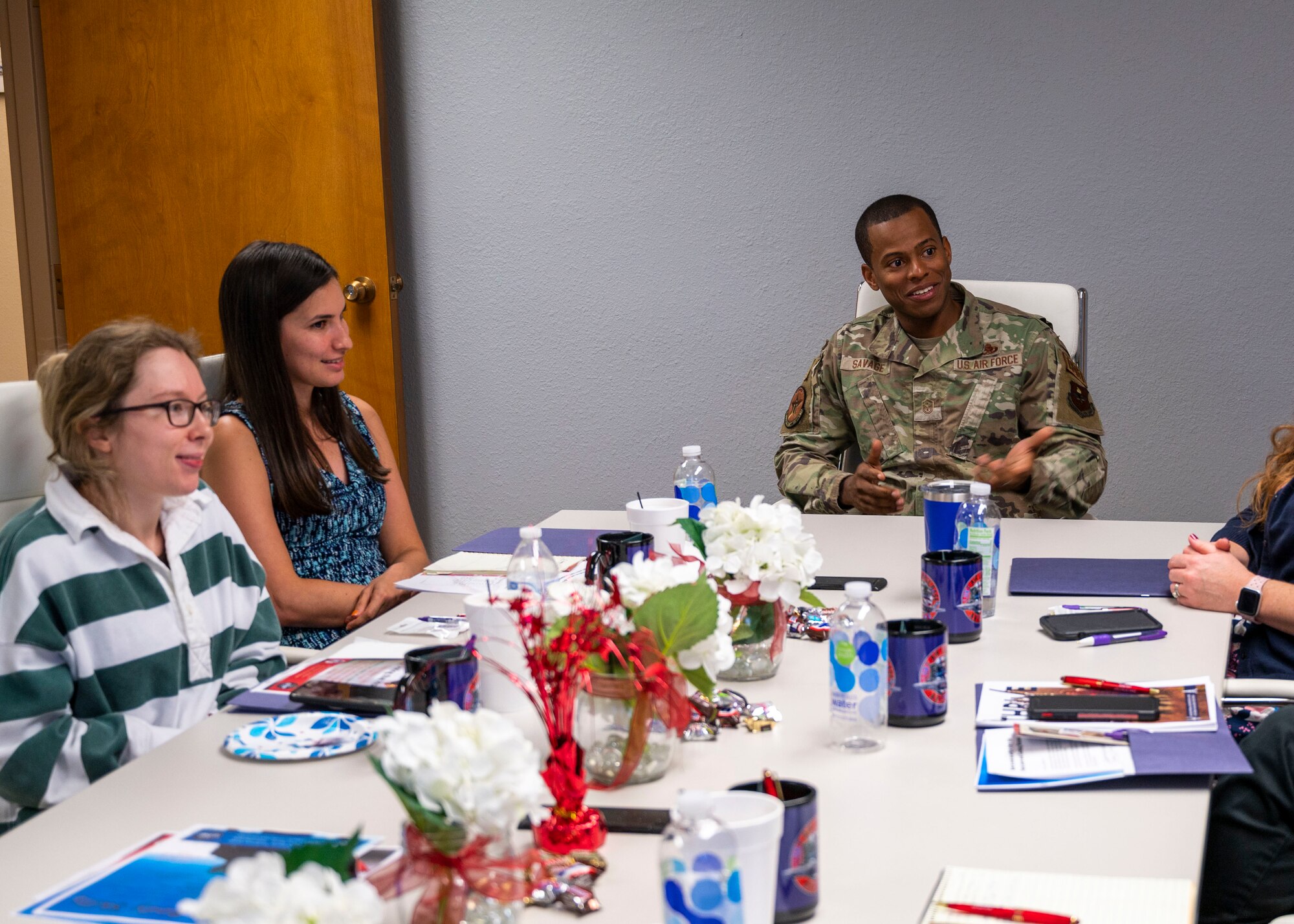 U.S. Air Force Master Sgt. Brandon Savage, 56th Component Maintenance Squadron first sergeant, talks to the military spouses during the Heart Link Spouse Orientation, Oct. 19, 2022, at Luke Air Force Base, Arizona.