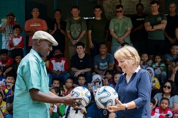 KOTA KINABALU, Malaysia (Oct. 22, 2022) Chaplain Lt. Daniel Lubega, from Huntsville, Alabama, assigned to Arleigh Burke-class guided-missile destroyer USS Milius (DDG 69), gifts soccer balls to the Etania School for Stateless Children in Kota Kinabalu, Malaysia, during a community relations event for a scheduled port visit, Oct. 22. Milius is assigned to Commander, Task Force 71/Destroyer Squadron (DESRON) 15, the Navy’s largest forward-deployed DESRON and the U.S. 7th Fleet’s principal surface force. (U.S. Navy photo by Mass Communication Specialist 2nd Class Richard Cho)