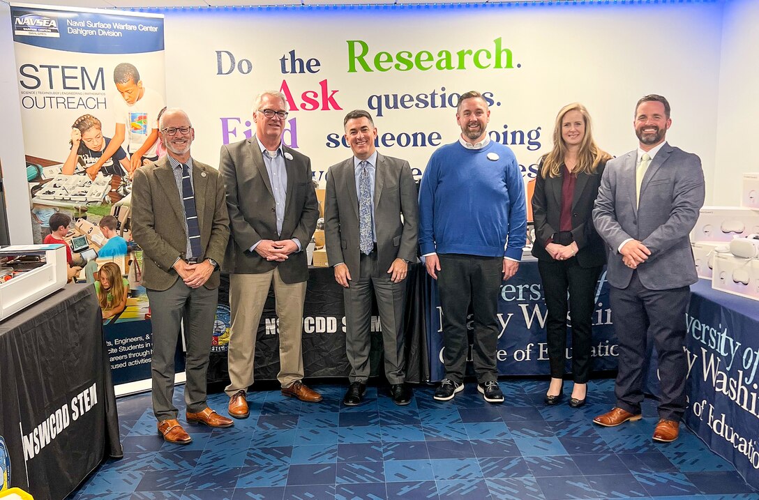 (Left to right) University of Mary Washington (UMW) President Troy Paino, UMW Dean of the College of Education Pete Kelly, Naval Surface Warfare Center Dahlgren Division (NSWCDD) Technical Director Dale Sisson, Jr., SES, UMW Assistant Professor of Special Education Kevin Good, NSWCDD Chief Technology Officer Jennifer Clift and Michael Clark, NSWCDD’s Director of Academic Engagement for K-12 for the Chief Technology Office, celebrated a nearly $30,000 donation of STEM equipment from NSWCDD to UMW on Oct. 18.