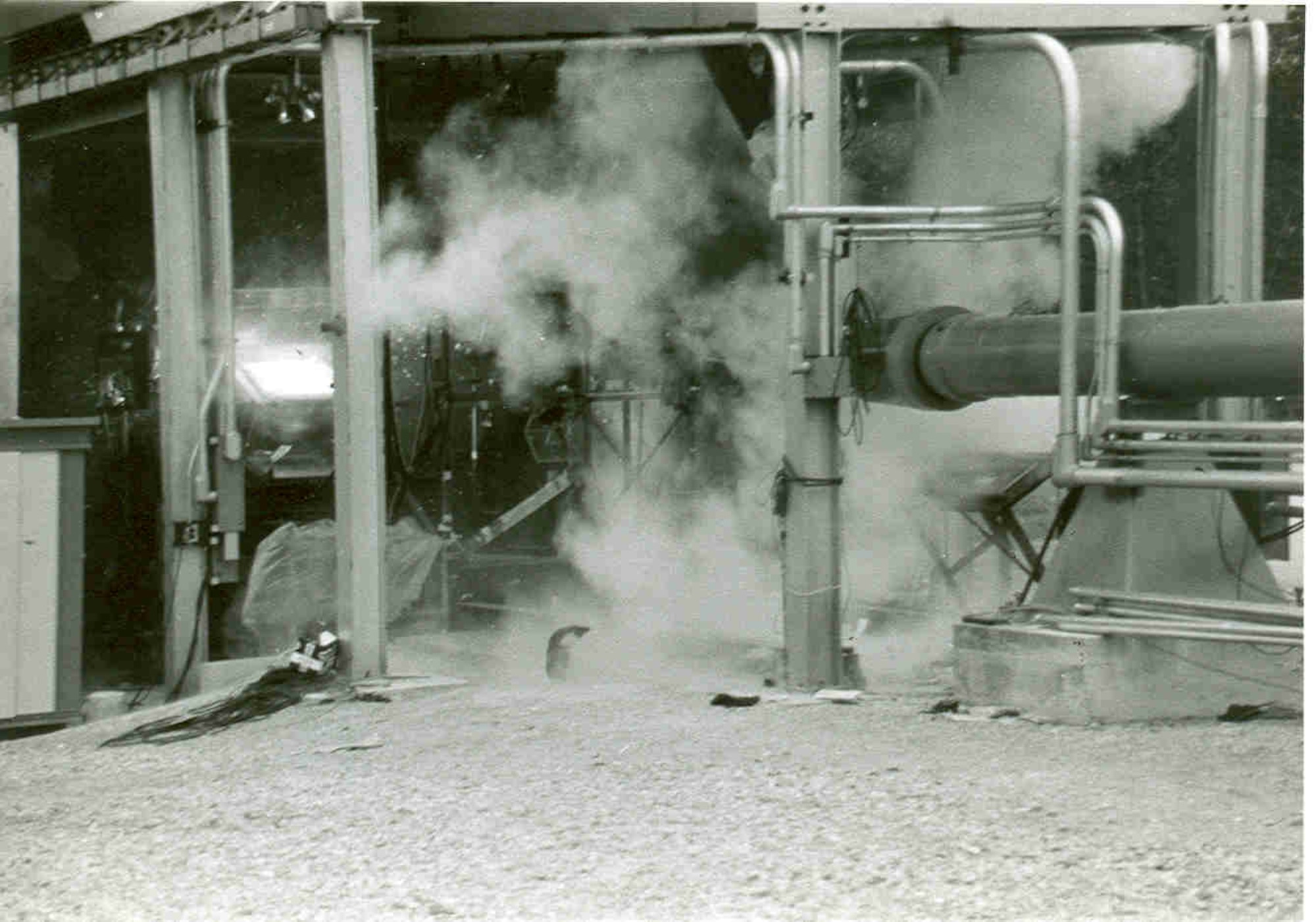 A practice round is fired in preparation for testing at the Bird Impact Range at Arnold Air Force Base, Tennessee, in 1973. The facility, commonly referred to as the “Chicken Gun,” was used to simulate in-flight bird strikes to aircraft canopies and other materials by launching chicken carcasses at test articles. The first shot from the Chicken Gun was fired 50 years ago. (U.S. Air Force photo)