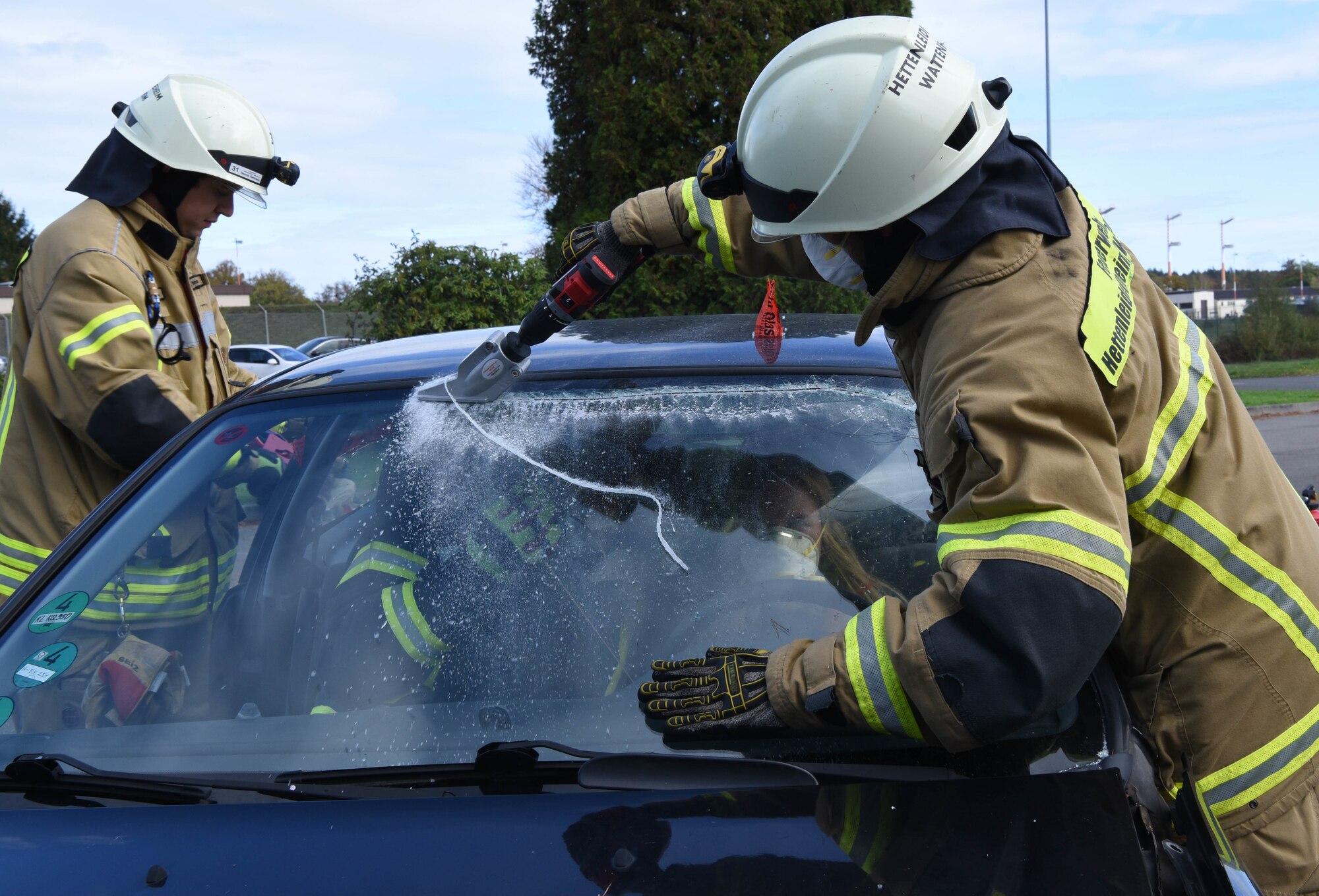 Firefighters from the Carlsberg and Hettenleidelheim fire department performed an extraction demonstration during an 86th Civil Engineer Squadron Fire Prevention Week open house at Ramstein Air Base