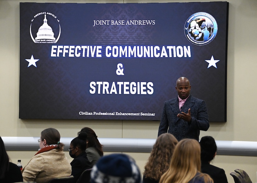 Chief Master Sgt. Slyvester Lawrence, Air Force District of Washington Airman Development Advisor special duty manager, discusses effective communication and strategies during the JBA Civilian Professional Enhancement Seminar at the General Jacob E. Smart Conference Center, Joint Base Andrews, Md., Oct. 27, 2022. Throughout the seminar, facilitators and Department of Defense civilians who work across the National Capital Region discussed topics such as effective communication and strategies, ethical leadership, and emotional intelligence. (U.S. Air Force photo by Airman 1st Class Austin Pate)