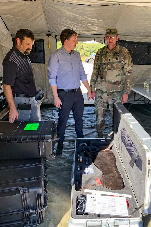 Soldiers and civilians assigned to the U.S. Army Medical Materiel Development Activity (USAMMDA), U.S. Army Medical Test and Evaluation Activity, U.S. Army Medical Logistics Command and 72nd Medical Veterinary Service Support Detachment collaborated to test the Vet X-ray Apparatus-Small at Fort Campbell, Ky., Sept. 29, 2022. The collaboration tested the feasibility of expeditionary lab equipment to fill a critical gap in U.S. military veterinary medicine in austere environments. USAMMDA, is the U.S. Army’s premier developer of new drugs, vaccines, devices and medical support equipment, routinely partners with both U.S. Department of Defense units and non-DOD organizations to provide Warfighters high-quality medical capabilities. (Courtesy Photo by Austin Langdon/Released)