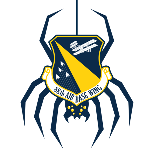 Wing icon with spider graphic.