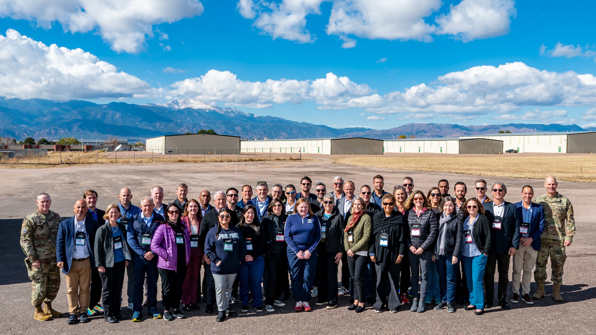 Members of Joint Civilian Orientation Conference Class 93 pose in front of Pikes Peak before visiting Peterson and Schriever Space Force Bases in Colorado Springs, Colorado, Oct. 24, 2022. While the JCOC program was established in 1948, this is the first year the class received a Space Force immersion day. During their visit, attendees of the JCOC met with senior Space Force leaders and Guardians and received mission briefs from the 2nd Space Operations Squadron and 527th Space Aggressor Squadron. (U.S. Space Force photo by Dave Grim)