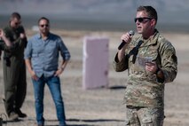 Air Force member speaks to people