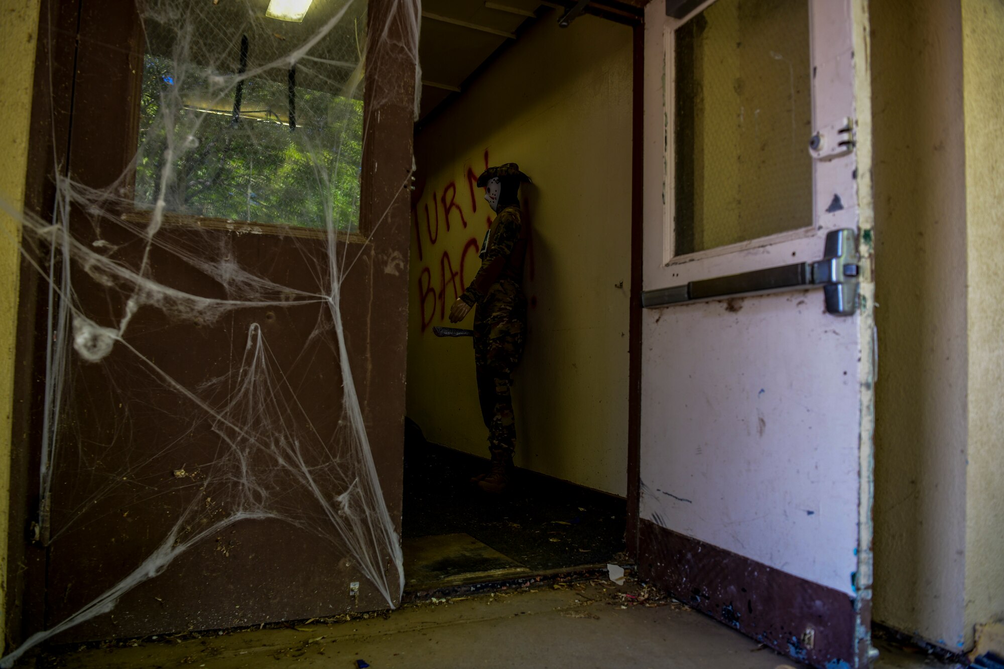A mannequin stands guard at the entrance of the haunted house at Beale Air Force Base