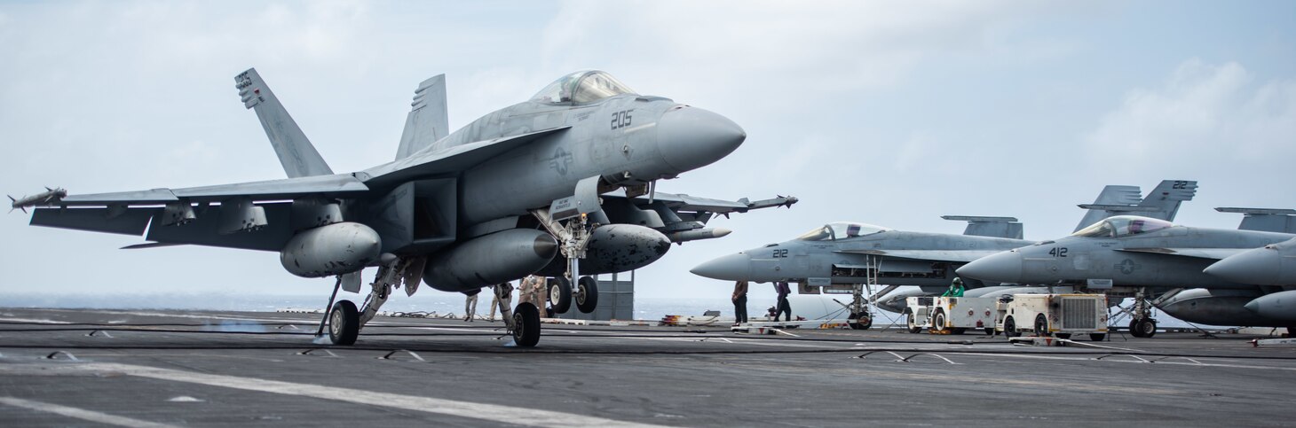 PHILIPPINE SEA (Oct. 27, 2022) An F/A-18E Super Hornet, attached to the Royal Maces of Strike Fighter Squadron (VFA) 27, lands on the flight deck of the U.S. Navy’s only forward-deployed aircraft carrier, USS Ronald Reagan (CVN 76), in the Philippine Sea, Oct. 27. The Royal Maces conduct carrier-based air strikes and strike force escort missions, as well as ship, battle group, and intelligence collection operations. Ronald Reagan, the flagship of Carrier Strike Group 5, provides a combat-ready force that protects and defends the United States, and supports alliances, partnerships and collective maritime interests in the Indo-Pacific region. (U.S. Navy photo by Mass Communication Specialist 3rd Class Eric Stanton)