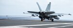 PHILIPPINE SEA (Oct. 27, 2022) An F/A-18E Super Hornet, attached to the Royal Maces of Strike Fighter Squadron (VFA) 27, lands on the flight deck of the U.S. Navy’s only forward-deployed aircraft carrier, USS Ronald Reagan (CVN 76), in the Philippine Sea, Oct. 27. The Royal Maces conduct carrier-based air strikes and strike force escort missions, as well as ship, battle group, and intelligence collection operations. Ronald Reagan, the flagship of Carrier Strike Group 5, provides a combat-ready force that protects and defends the United States, and supports alliances, partnerships and collective maritime interests in the Indo-Pacific region. (U.S. Navy photo by Mass Communication Specialist 3rd Class Eric Stanton)