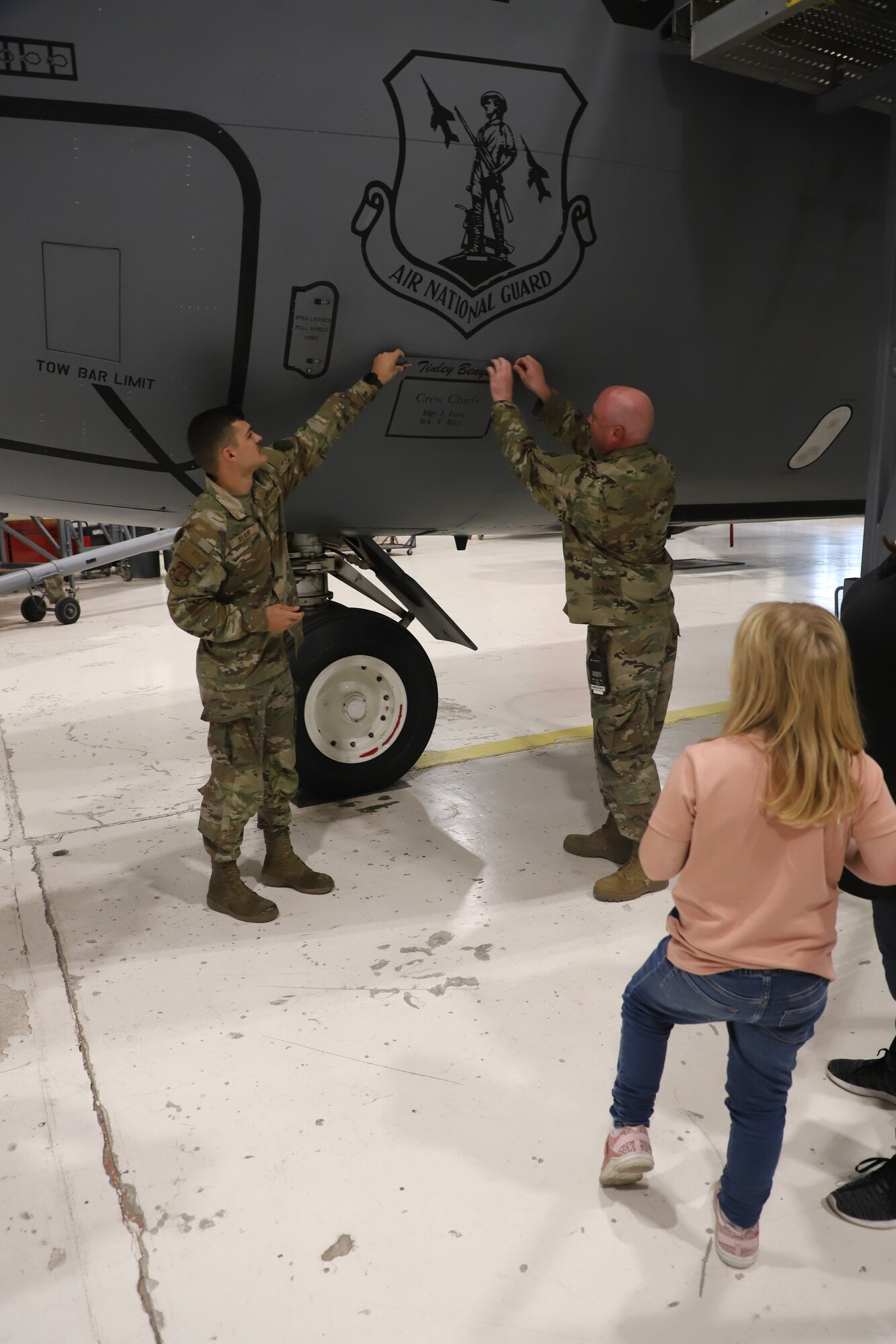 Tinley Benyshek, Pilot for the Day, receives her name plate off a KC-135 at the 190th Air Refueling Wing in Topeka, KS, October 24, 2022. Tinley is the first Pilot for a Day participant at the 190th ARW.