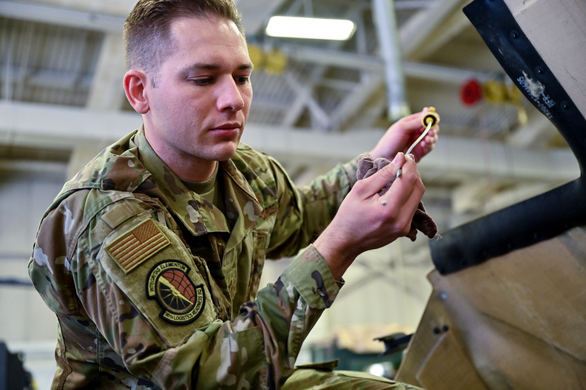 Senior Airman Korey Sarantopoulos, 90th Logistics Readiness Squadron vehicle maintenance journeyman, checks the electrical, brake, fuel, cooling and other systems for serviceability as part of a Joint Light Tactical Vehicle limited technical inspection at F.E. Warren Air Force Base, Wyoming, Oct 25, 2022. The 90 LRS is tasked with preparing the next generation of security forces vehicles sent to protect the 90th Missile Wing's ICBM system as part of Air Force Global Strike Command’s priority to modernize. (U.S. Air Force photo by Joseph Coslett)