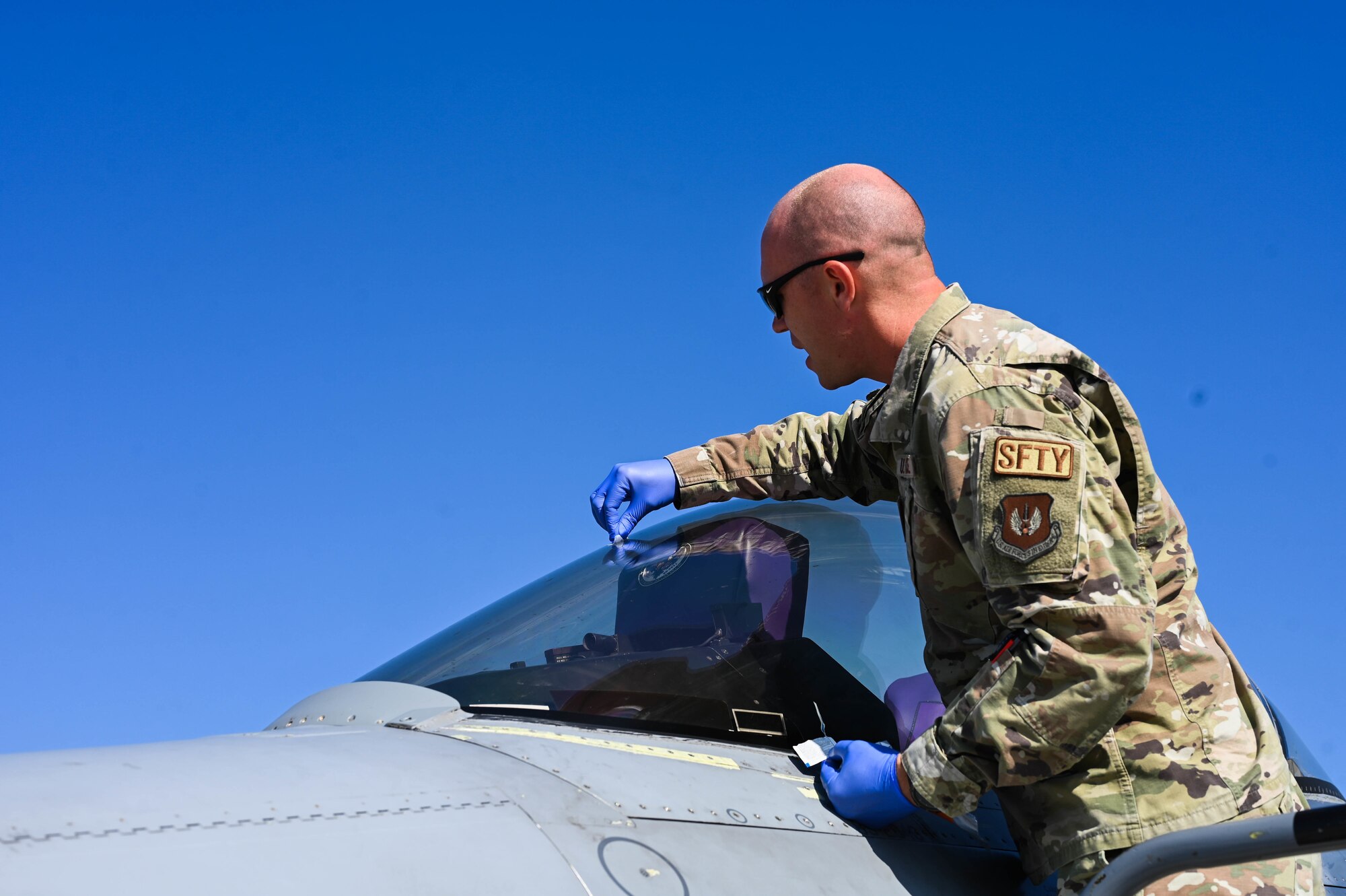 The Bird/Wildlife Aircraft Strike Hazard team takes samples and sends them to the Smithsonian Institution, Feather Identification Lab in Washington, D.C., for further processing. (U.S. Air Force photo by Senior Airman Noah Sudolcan)
