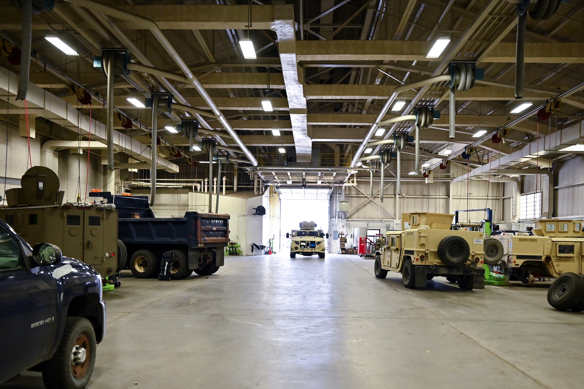 Mark Bramman, 90th Logistics Readiness Squadron vehicle maintenance craftsman, drives a Joint Light Tactical Vehicle into the maintenance bay before performing a limited technical inspection on F.E. Warren Air Force Base, Wyoming, Oct 25, 2022. The 90 LRS is tasked with preparing the next generation of security forces vehicles sent to protect the 90th Missile Wing’s ICBM system as part of Air Force Global Strike Command’s priority to modernize. (U.S. Air Force photo by Joseph Coslett)