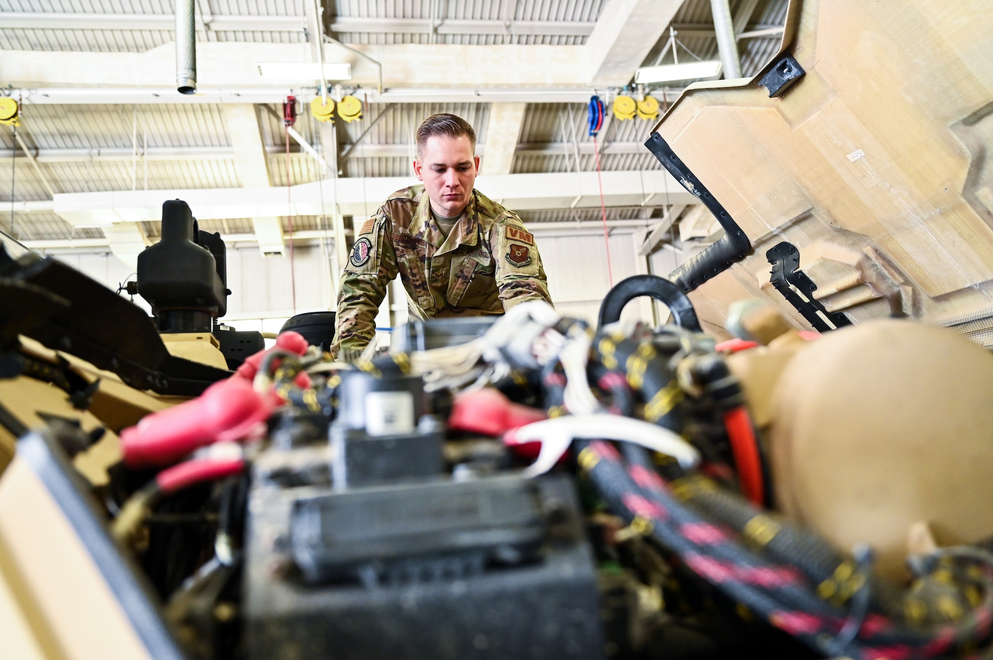 Senior Airman Korey Sarantopoulos, 90th Logistics Readiness Squadron vehicle maintenance journeyman, checks the electrical, brake, fuel, cooling and other systems for serviceability as part of a Joint Light Tactical Vehicle limited technical inspection at F.E. Warren Air Force Base, Wyoming, Oct 25, 2022. The 90 LRS is tasked with preparing the next generation of security forces vehicles sent to protect the 90th Missile Wing's ICBM system as part of Air Force Global Strike Command’s priority to modernize. (U.S. Air Force photo by Joseph Coslett)