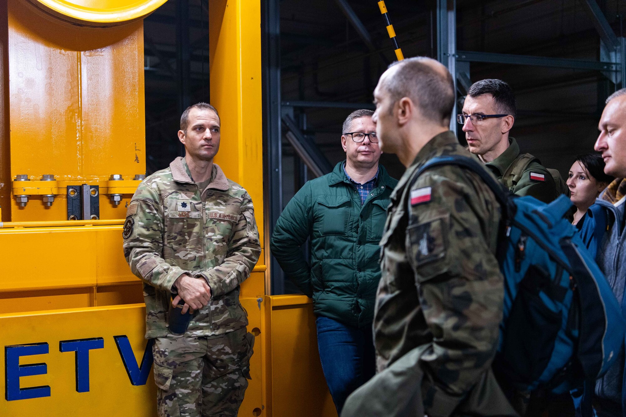 Polish airmen tour the 721st Aerial Port Squadron at Ramstein Air Base, Germany, on October 26, 2022.