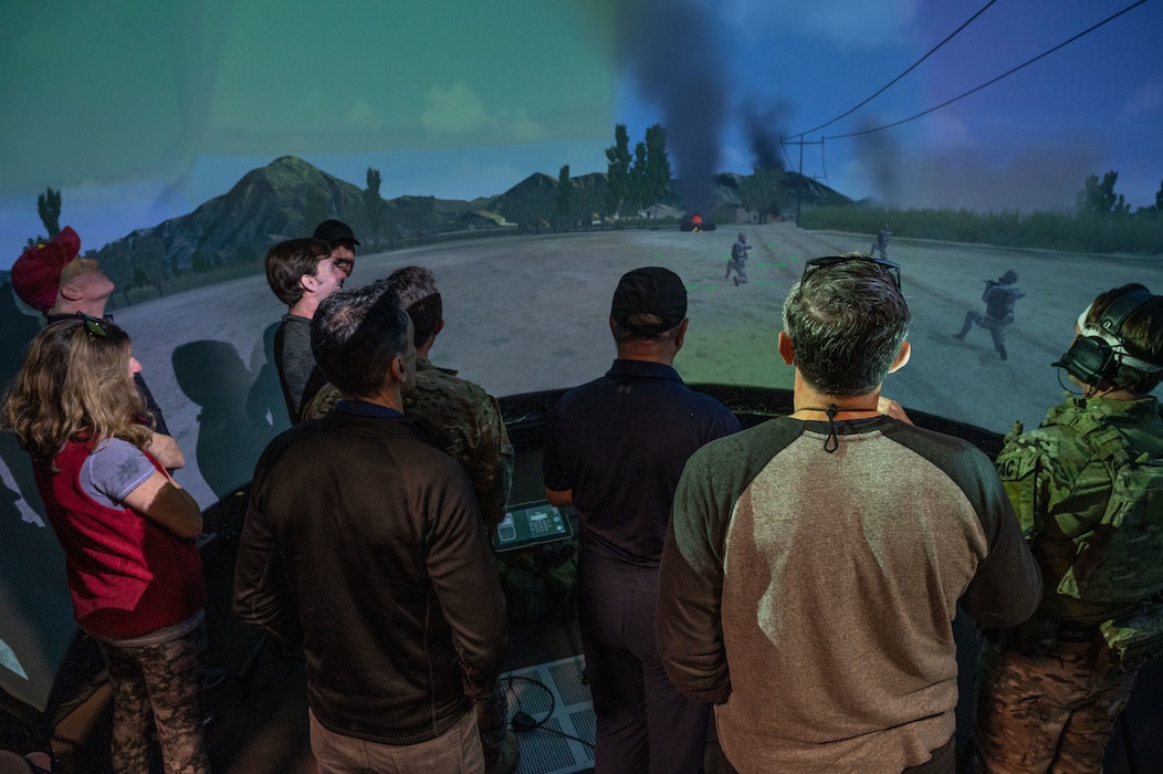 People observing a JTAC simulator