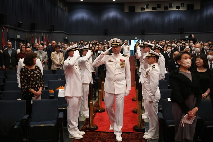 Capt. Tim DeWitt, Naval Facilities Engineering Systems Command Fast East, is relieved by Capt. Lance Flood during a change of command and retirement ceremony for DeWitt on board Fleet Activities Yokosuka, Japan, Oct. 28.