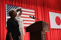 Capt. Tim DeWitt, Naval Facilities Engineering Systems Command Fast East, is relieved by Capt. Lance Flood during a change of command and retirement ceremony for DeWitt on board Fleet Activities Yokosuka, Japan, Oct. 28.