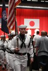 Capt. Tim DeWitt, Naval Facilities Engineering Systems Command Fast East, is relieved by Capt. Lance Flood during a change of command and retirement ceremony for DeWitt on board Fleet Activities Yokosuka, Japan, Oct. 28.